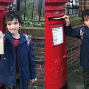 A young Hackney pirate delivers his postcard.