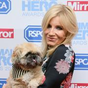 Michelle Collins and Humphrey attending The Animal Hero Awards held at Grosvenor House Hotel in 2017. Picture: Ian West/PA Wire