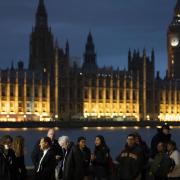 Members of the public queued on the South Bank in London, as they waited to view Queen Elizabeth II lying in state