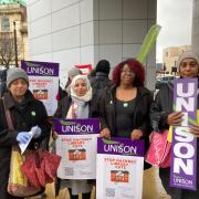 Homerton Library workers Hamida Mulla and Amina Pirbhai, library user Michelle Moseley and Dalston Library worker Wendy Edwards on the picket line (Image: Newsquest)