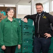 Pat Fitzsimons Hackney Foodbank CEO (left) and Omaze's James Oakes