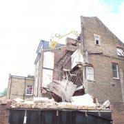 A three-storey house in Gloucester Road collapsed