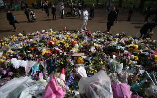 Floral tributes left at the band stand in Clapham Common, London, for murdered Sarah Everard. Serving police constable Wayne Couzens, 48, appeared in court on Saturday charged with kidnapping and murdering the 33-year-old marketing executive, who went