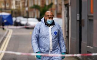 Forensic officers were seen at Cranbrook Street