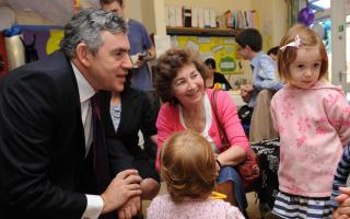 Then Prime Minister Gordon Brown meets children at a Sure Start Children's Centre in 2008 (Image: PA)